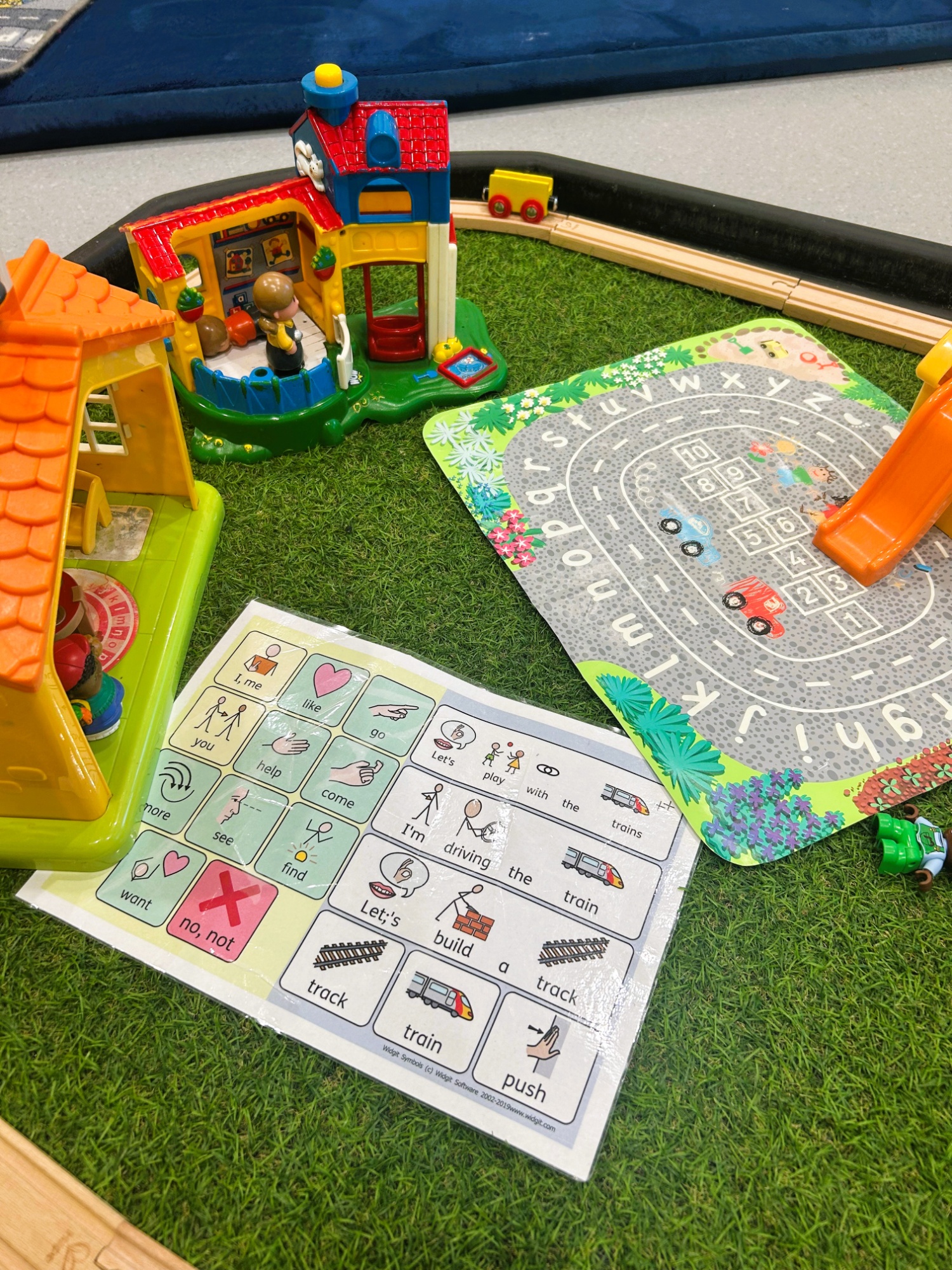 Tuff tray activity with trains at Daventry Hill School